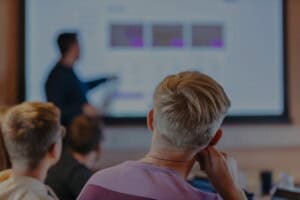 Team looking at screen in meeting