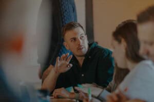 Jack speaking in team meeting